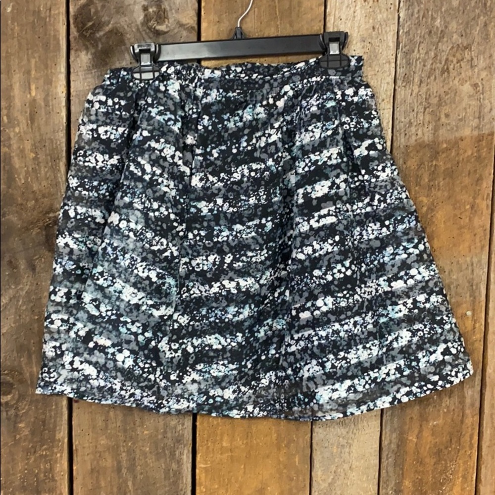 Above the knee skirt.